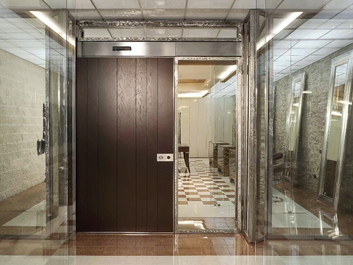 VELA - Sliding wooden safety door _ OIKOS VENEZIA